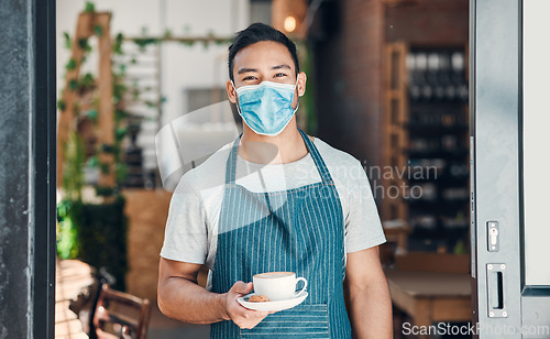 Image of Barista, man and face mask portrait with coffee with hospitality and service in a small business. Restaurant, hot drink and cafe owner at door with latte and cappuccino of manager and entrepreneur