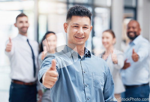 Image of Smile, thumbs up and business people in portrait at startup with confidence, pride and project management company. Teamwork, commitment and vision, happy team with yes hand sign in corporate office.