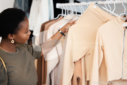 Image of Fashion, shopping and choice with black woman in boutique for luxury, sale and retail. Store, product and consumerism with female customer buying in mall for shopaholic, purchase and clothes