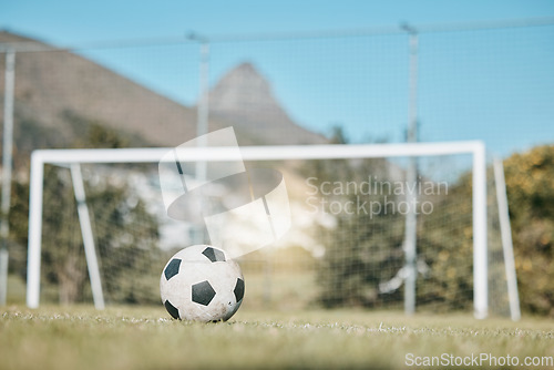 Image of Soccer ball, sports and goal post on empty field for mockup space, fitness and training outdoor. Football club, pitch and event or game for sport competition, exercise and green grass background