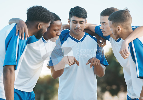 Image of Sports group, soccer and team talking and planning on field for fitness training or competition. Football player, club and diversity athlete men together for scrum, game plan and teamwork outdoor