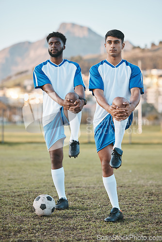 Image of Football, team sports and stretching legs on field for fitness, exercise and training outdoor. Soccer ball, pitch and diversity athlete men together for sport competition, workout or muscle warm up