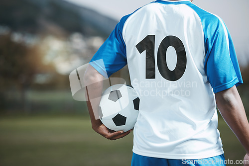 Image of Soccer ball, sports and man with uniform number on a field for exercise, fitness and training outdoor. Football club, pitch and event or game with athlete person and mockup for sport competition
