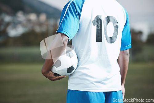 Image of Sports, soccer ball and man with uniform number on a field for exercise, fitness and training outdoor. Football club, pitch and event or game with athlete person and mockup for sport competition