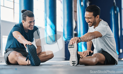 Image of Men smile, gym and legs stretching of friends before training, fitness and workout in health club. Warmup, athlete and man ready to start sport exercise together on the floor with personal trainer