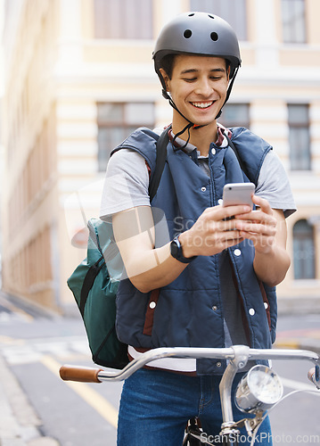 Image of Man, delivery bicycle and smile with phone, order or ecommerce app for food, product and sustainable transport. Young guy, bike and metro street with texting, chat and eco friendly with logistics job