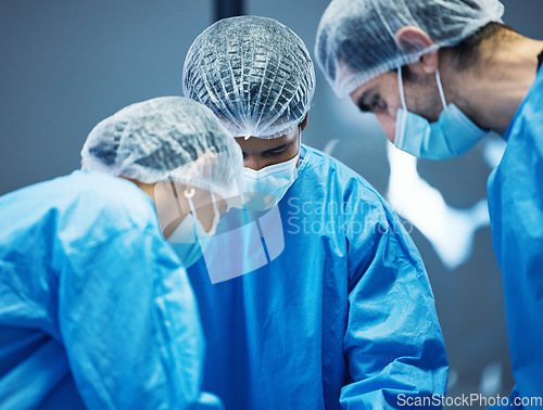 Image of Team of doctors n surgery, healthcare and surgical procedure start with PPE and collaboration in operation theatre in hospital. Medical, health insurance and safety gear with surgeon people in clinic