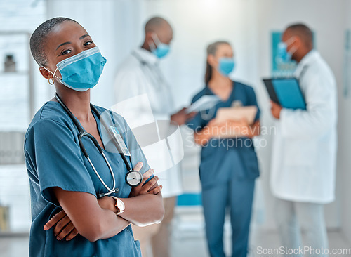 Image of Face mask, doctor and portrait of black woman with crossed arms for medical help, insurance and trust. Healthcare, hospital team and face of female health worker for service, consulting and care