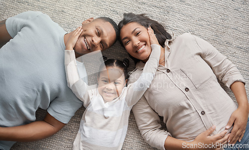 Image of Top view, mom and dad with portrait of happy child for love, care and bonding of quality time together at home. Face of mother, father and girl kid relax with family in house for fun, smile and play