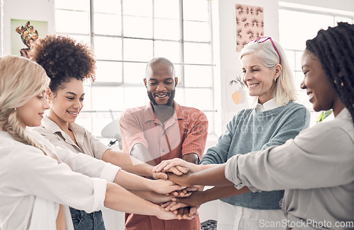 Image of Team work, hands of business people together with smile, goals and collaboration at start up agency. Happy team, motivation and hand stack with huddle, employees working with cooperation in office