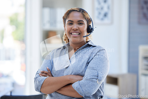 Image of Woman, call center headset and smile with arms crossed for telemarketing, crm or sales success. African person or support agent happy about customer service, contact us or help desk startup career