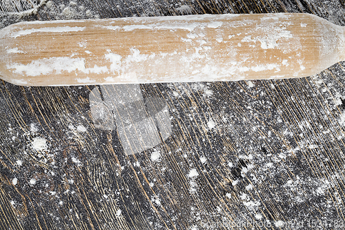 Image of white wheat flour on a wooden table
