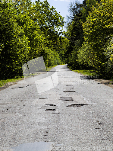 Image of road with holes