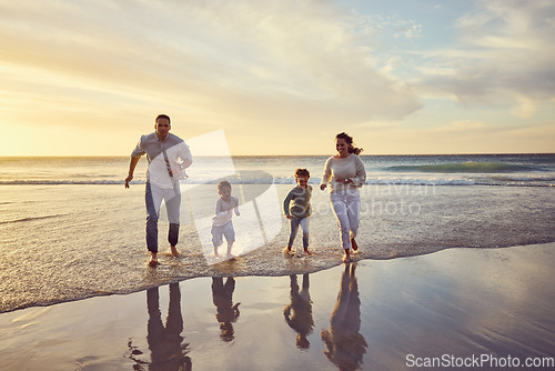 Image of Beach, sunset and parents play with kids on holiday, summer vacation and weekend together. Nature, family and happy mother, father and children run in ocean for bonding, adventure and quality time