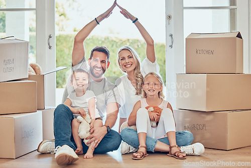 Image of Portrait of happy family, new house and roof hands for insurance, safety and future investment in real estate. Moving, boxes and happiness, woman and man with kids in home with property mortgage.