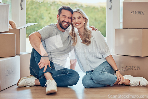 Image of House, portrait and happy couple on floor of new home, real estate and property loan for relocation. Man, woman and partner moving in together for building investment, mortgage and boxes in apartment