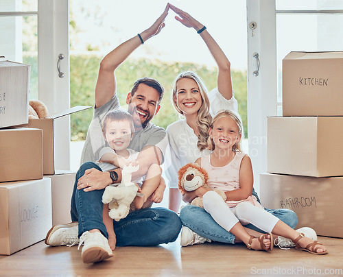 Image of Portrait of happy family, new home and roof for security, safety and future investment in real estate. Moving, boxes and happiness, mom and dad with kids in house with insurance for property mortgage