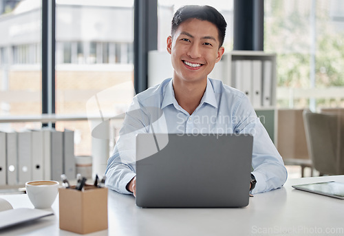 Image of Laptop, smile and asian man secretary typing a schedule online, internet and web in an office happy at a company. Email, corporate and person or employee at information desk search on a website