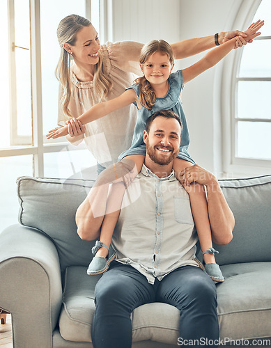 Image of Happy family, portrait and child on sofa with flying game, piggy back and play in living room for man and woman. Mother, father and kid playing airplane games on couch with smile, happiness and love.