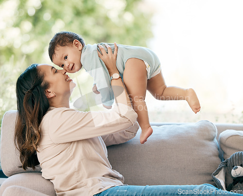 Image of Love, airplane and mother with baby on a sofa for games, playing and laughing in their home together. Family, smile and mom with girl toddler on a couch, relax and flying, fun and hug in living room