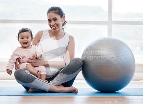 Image of Mom, baby and floor in portrait by exercise ball, laughing and bonding together for fitness, health and wellness. Workout, pregnant mother and newborn with happiness, home and excited face for yoga