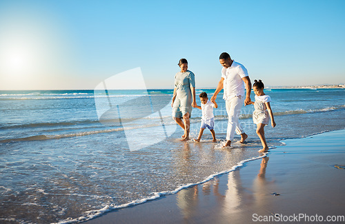 Image of Family travel, beach walking and holding hands with mother, father and kids at ocean on holiday. Vacation and parent care with mockup in summer outdoor with mom, dad and children by sea having fun