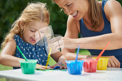 Image of Happiness, mother and daughter painting, fun with art and messy with watercolor creativity outdoor. Woman with girl, mom bonding with female child and creative activity with color paint in backyard