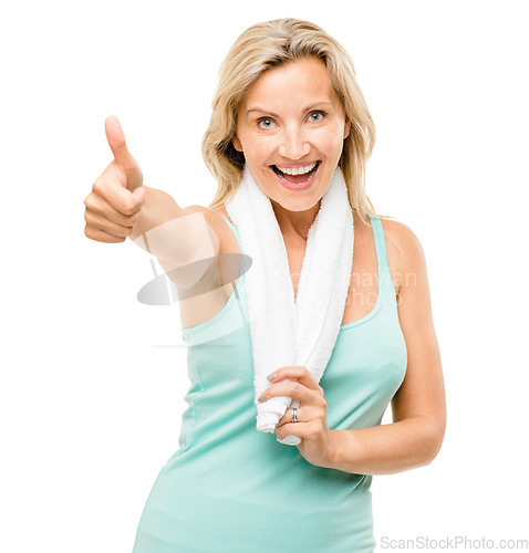 Image of Portrait, fitness and thumbs up with a senior woman in studio isolated on a white background for health. Exercise, motivation or support and a happy mature female athlete saying yes with a like emoji