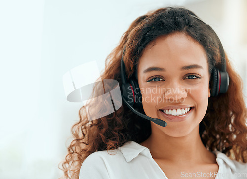 Image of Call center woman, portrait and smile in office with pride, career vision and consulting with mockup space. Telemarketing consultant, happy and contact us for customer service, tech support and crm