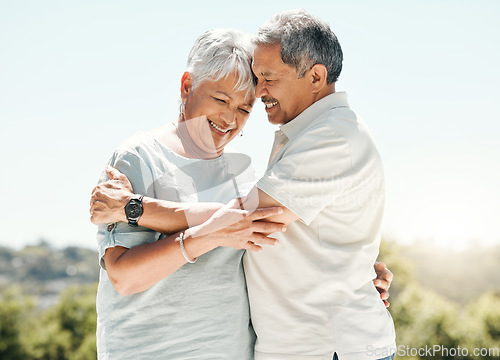 Image of Senior couple, hug and happy in nature on vacation, holiday or summer bonding. Love, hugging and retirement of man and woman with a smile and enjoying quality time together on intimate date mockup.