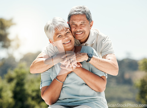 Image of Senior couple, portrait and hug in nature on vacation, holiday or summer bonding. Face, hugging and retirement of man and woman with a smile, love and enjoying romantic time together on mockup space.