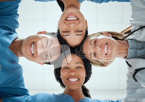 Image of Portrait, teamwork or faces of doctors in huddle with a happy collaboration for healthcare diversity. Smiling, team building or low angle of medical nurses with group support, motivation or mission