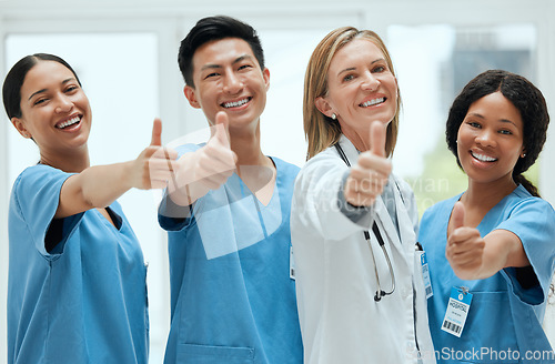 Image of Teamwork, happy or portrait of doctors with thumbs up for healthcare, medical consulting or success. Thumb up, nurses or surgeons smiling with good hand gesture for diversity in hospital together