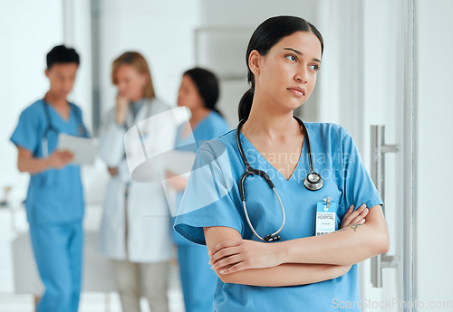 Image of Woman thinking, stress or sad nurse with burnout, anxiety or problem worried by medical emergency. Worry, tired woman or depressed healthcare doctor with grief, fear or depression in hospital clinic