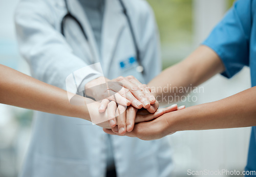 Image of Stack, team building or hands of doctors with collaboration for healthcare goals in meeting or community. Closeup, teamwork or medical nurses with group support, motivation or mission in hospital