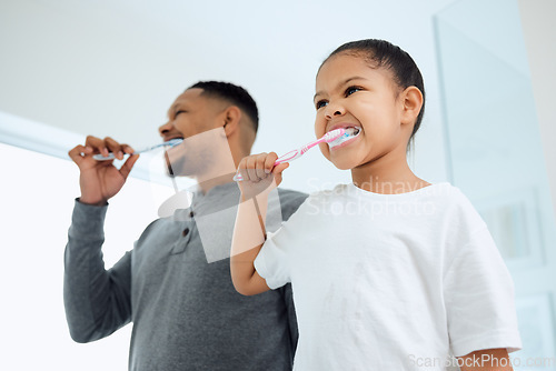 Image of Love, girl and father brushing teeth, dental care and wellness with fresh breath, learning and development. Family, dad or daughter in a bathroom, home and oral health with female child with hygiene