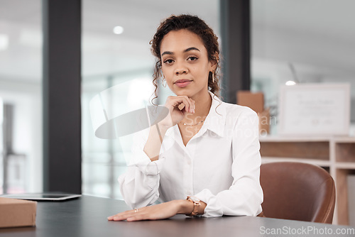 Image of Business woman, pride and confident in portrait, success and professional mindset in workplace. Corporate female employee at desk, career mission and ambition with empowerment at agency office