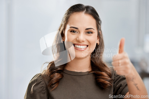 Image of Woman, portrait and thumb up with smile at the office for an achievement with entrepreneur in a workplace. Female professional, happy and agreement with employee working at a company for success.