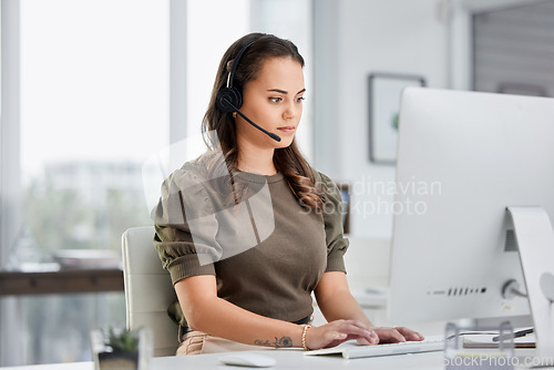 Image of Virtual assistant, computer or woman typing in call center consulting online at customer services help desk. Research, crm agent or girl consultant in telemarketing or telecom sales company in office