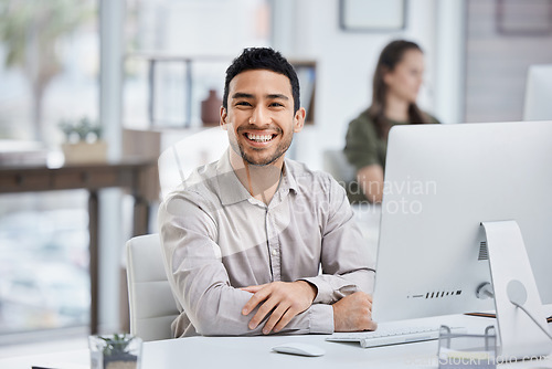 Image of Businessman, smile and portrait with a computer at desk for research, planning and internet connection. Happy asian male entrepreneur with a desktop pc in a modern office for a corporate project