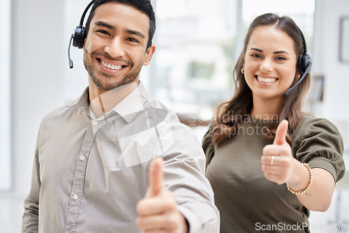 Image of Call center, portrait or happy team with thumbs up for support or agreement in telemarketing company. Smile, man or woman with like, success or thumb up hand sign at telecom customer services office