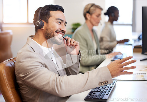 Image of Call center, speaking and business man in office, agency or e commerce, talking or client account helping. Agent, virtual consultant or happy person on computer advice, support and customer solution