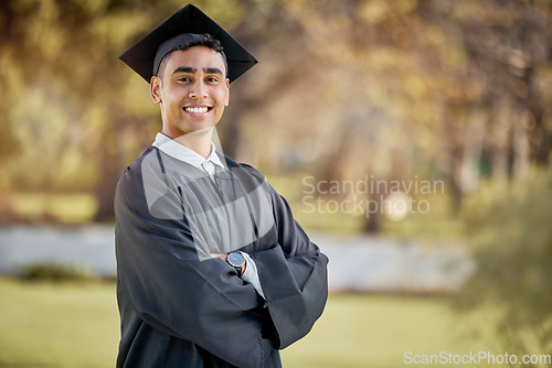 Image of Portrait of happy man, graduation or student in university campus with degree, scholarship or education. Success, smile or male Indian graduate standing outdoors in college with school achievement