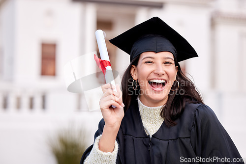 Image of Success, portrait of college student and with certificate on her graduation day outside of campus. Education or achievement, graduate or smile and female person with diploma at university outdoors