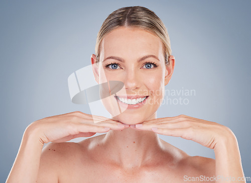 Image of Beauty, skincare and happy with portrait of woman in studio for facial, cosmetics and natural makeup. Self care, wellness and mockup with face of model on grey background for glow, smile and collagen