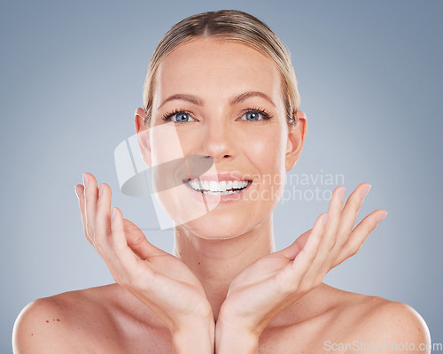 Image of Beauty, smile and portrait of woman in studio for facial, cosmetics and natural makeup. Self care, wellness and mockup with face of female model on grey background for glow, happiness and collagen