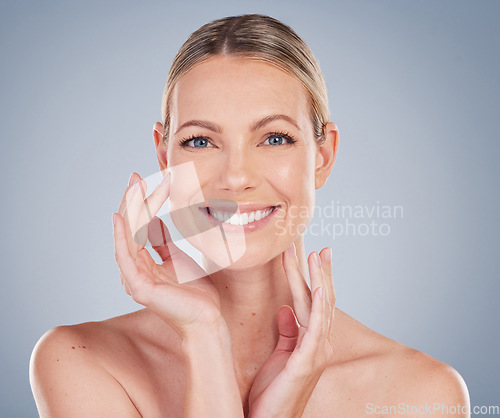 Image of Beauty, skincare and natural with portrait of woman in studio for facial, cosmetics and makeup. Self care, wellness and mockup with face of model on grey background for glow, happiness and collagen