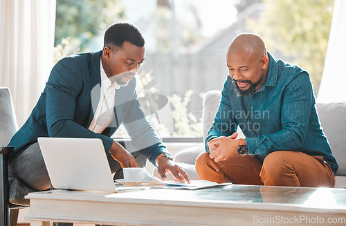 Image of Broker, contract and talking to man in a house for meeting or consultation for advice. Financial advisor with a client or black person for investment, savings or budget and insurance plan on paper