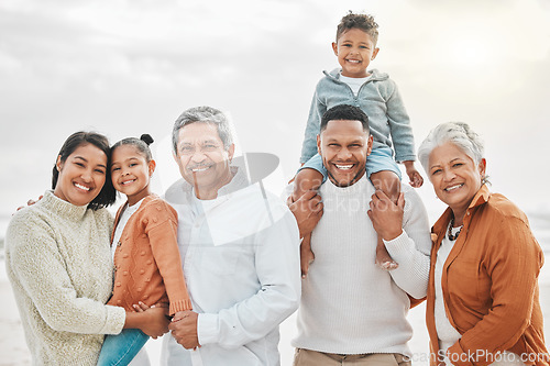 Image of Happy family, outdoor portrait and beach with grand parents, parent love and kids together by sea. Fun, vacation and children with grandmother and father by ocean on holiday with people and smile