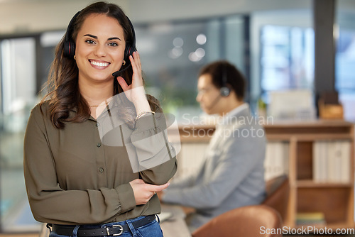 Image of Business woman, portrait and call center support with telemarketing and contact us agency. Female worker, consultant and crm employee with smile on customer service and consulting job in office